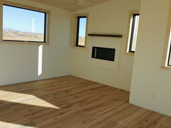 Solid wood floor made from two inch thick oak boards.  The floor is shown prior to finish.