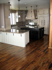 reclaimed floors and milk paint cabinets