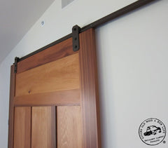 contemporary barn door on black sliding door track