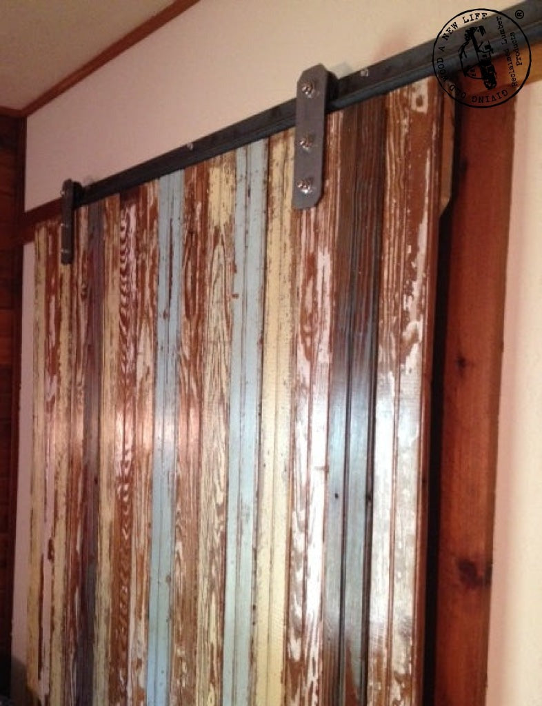 custom painted barn door on heavy duty track system